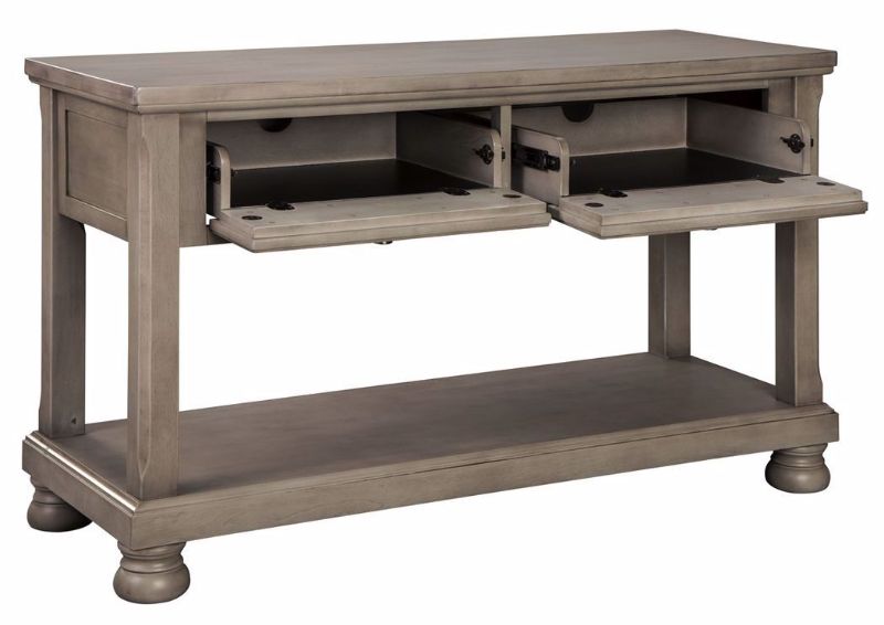 Gray Lettner Sofa Table by Ashley Furniture at an Angle With the Drawer Fronts Dropped Down | Home Furniture Plus Mattress