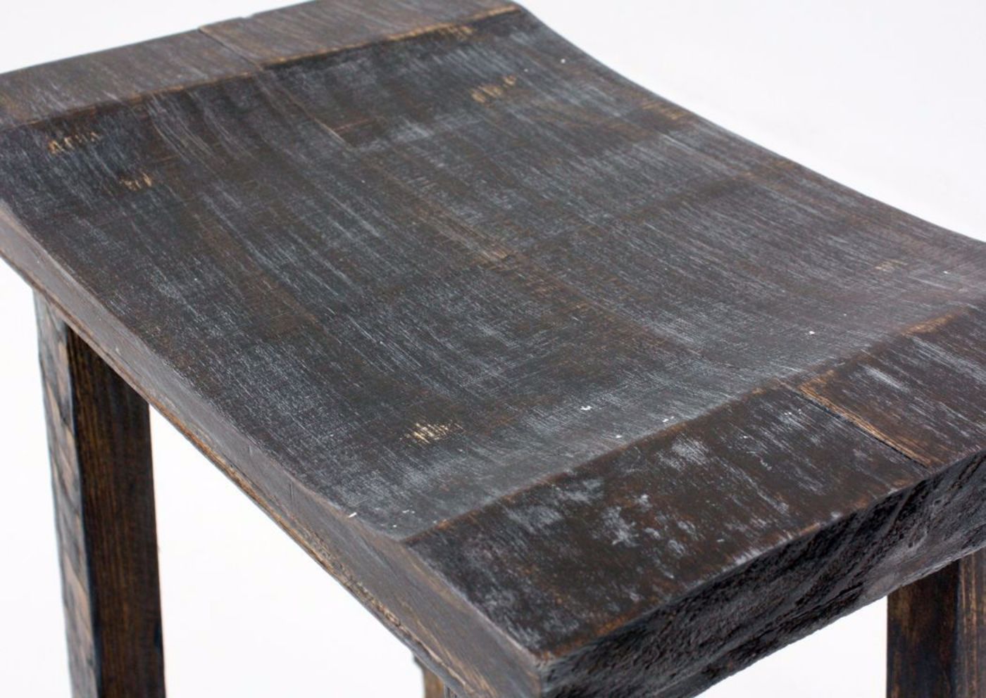 Weathered Brown Harland 24 Inch Bar Stool Showing the Saddle Seat Detail | Home Furniture Plus Mattress