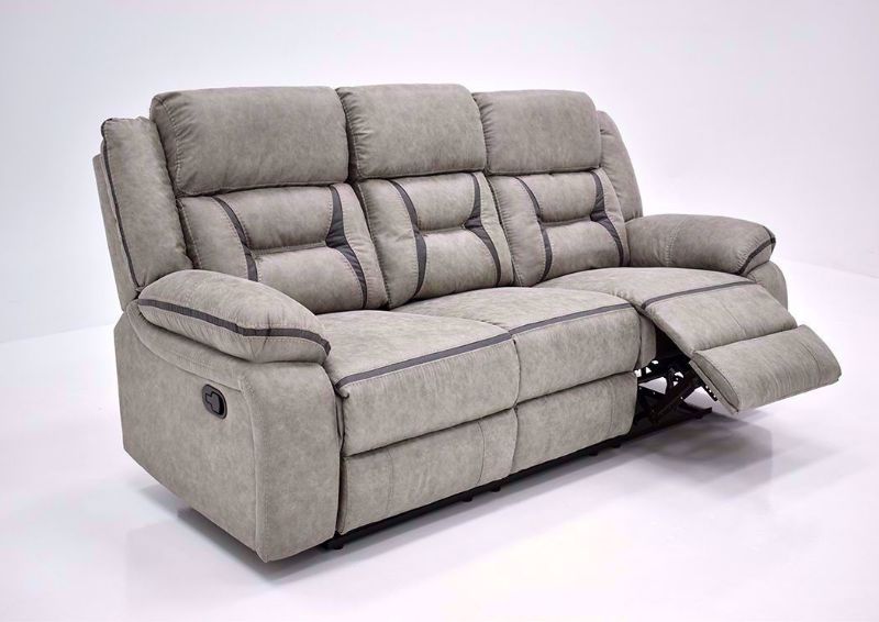 Taupe Acropolis Reclining Sofa by Standard at an Angle With One Recliner Open | Home Furniture Plus Bedding