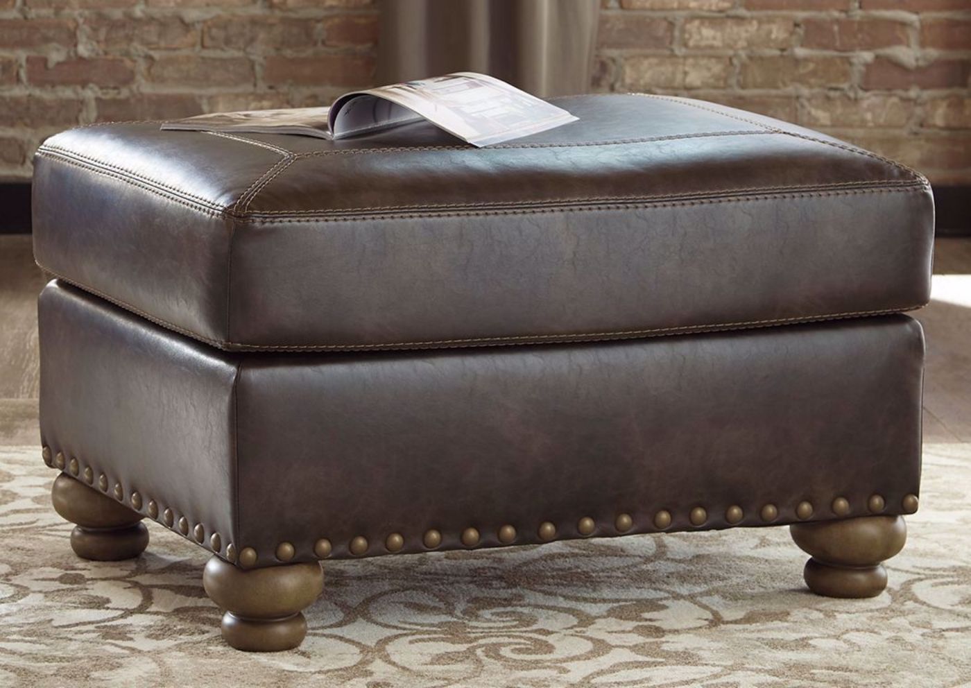 Brown Nicorvo Ottoman by Ashley in Room Setting | Home Furniture Plus Bedding