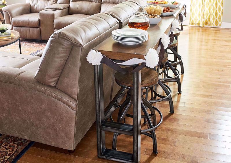 Brown Chandler Sofa Table Bar Set Showing it in a Room Setting Positioned Behind a Sofa | Home Furniture Plus Bedding