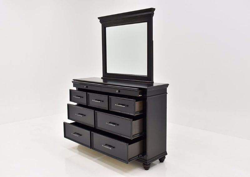 Dark Brown Brynhurst Dresser with Mirror by Ashley Furniture at an Angle with the Drawers Open | Home Furniture Plus Mattress