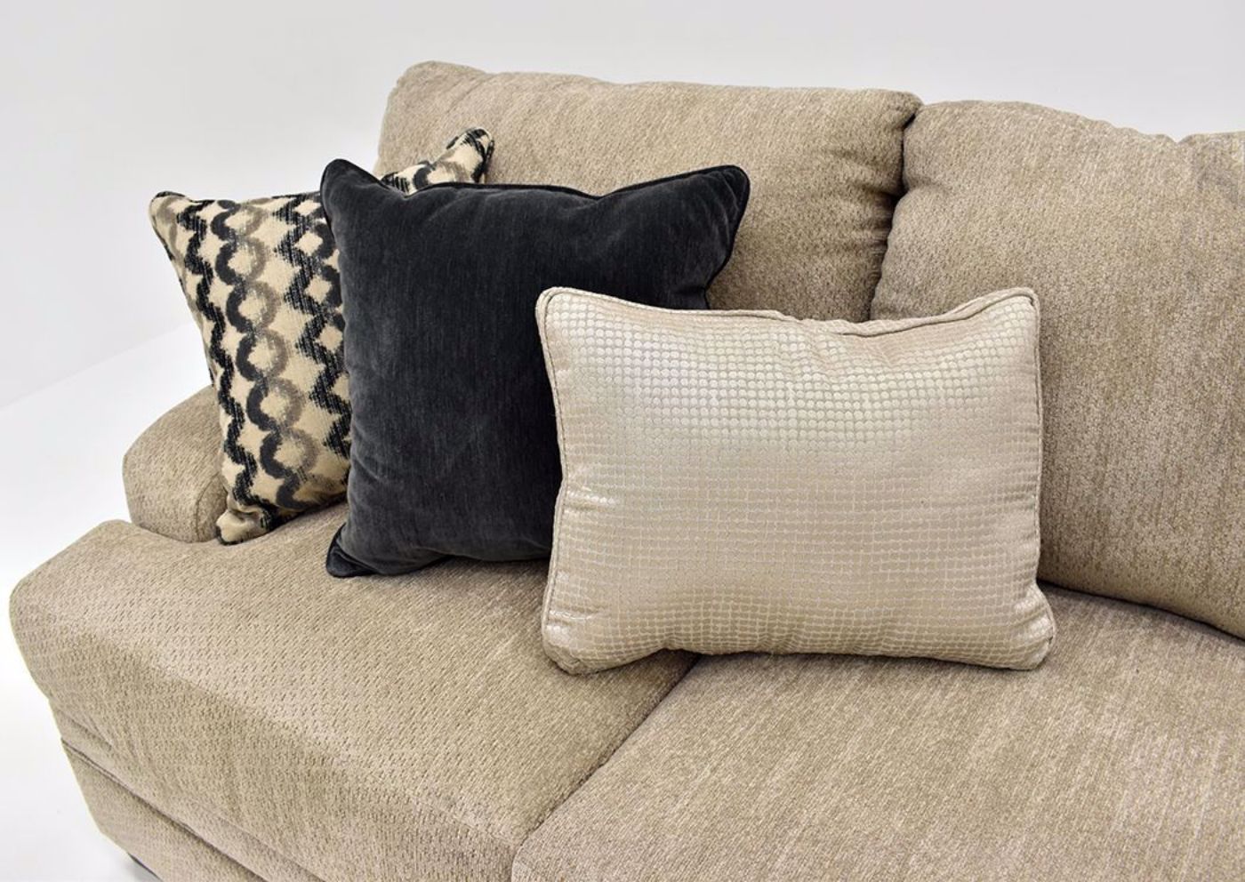 Beige Bellamy Sofa by Simmons Upholstery Showing the Accent Pillow Details | Home Furniture Plus Mattress