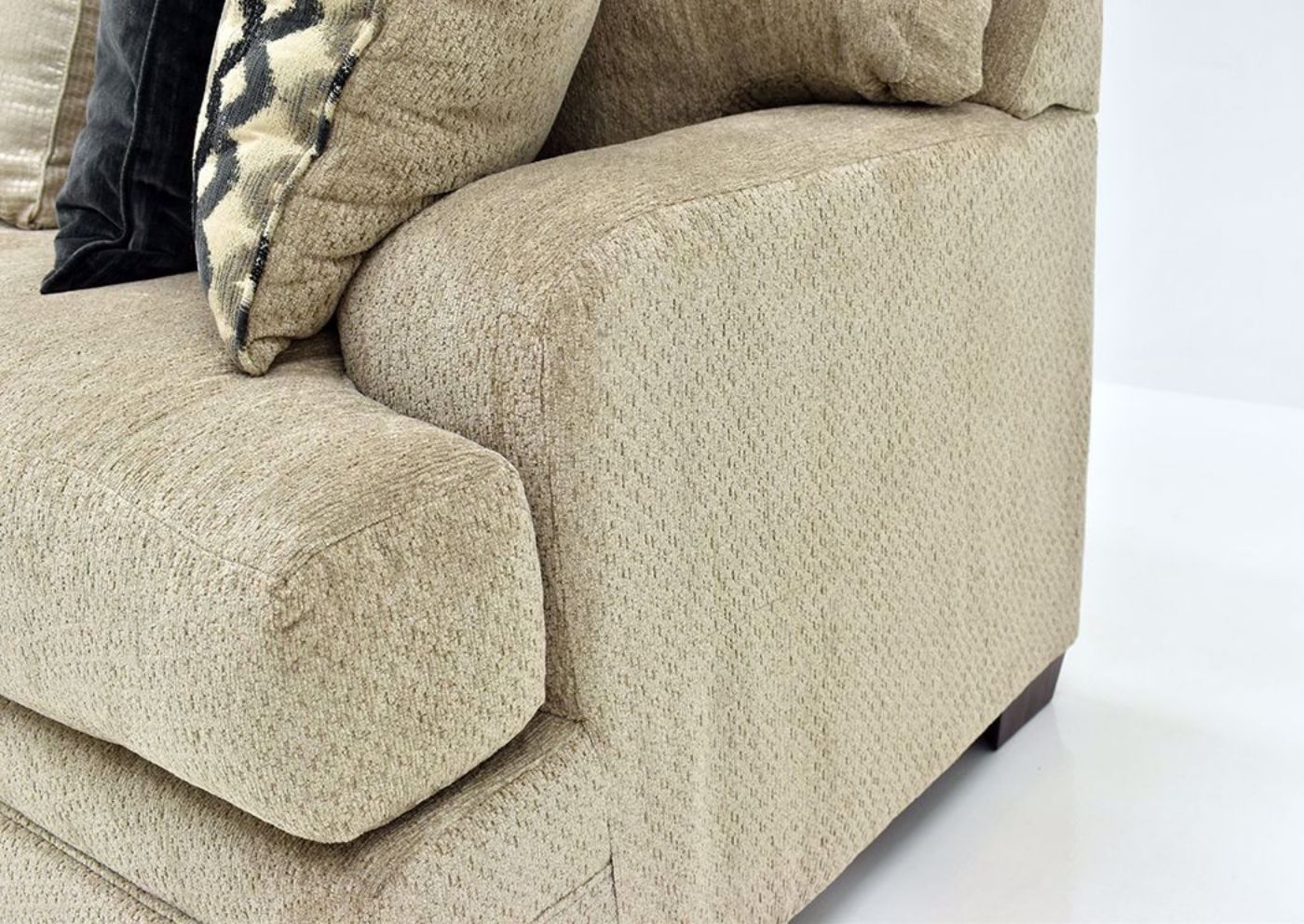 Beige Bellamy Sofa by Simmons Upholstery Showing the Arm Details | Home Furniture Plus Mattress