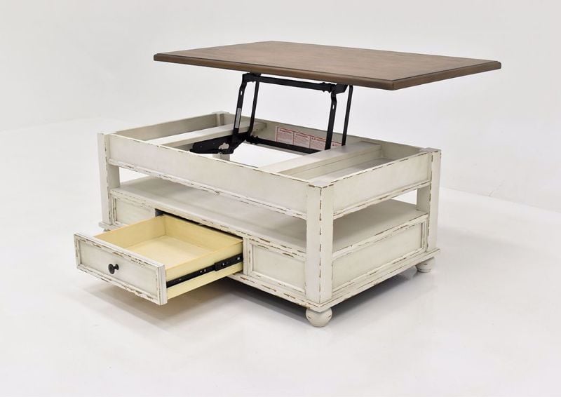 Distressed White Realyn Lift Top Coffee Table by Ashley Furniture at an Angle with the Lift Top and Drawer Open | Home Furniture Plus Mattress