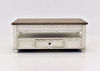 Distressed White Realyn Lift Top Coffee Table by Ashley Furniture Facing Front in the Closed Position | Home Furniture Plus Mattress