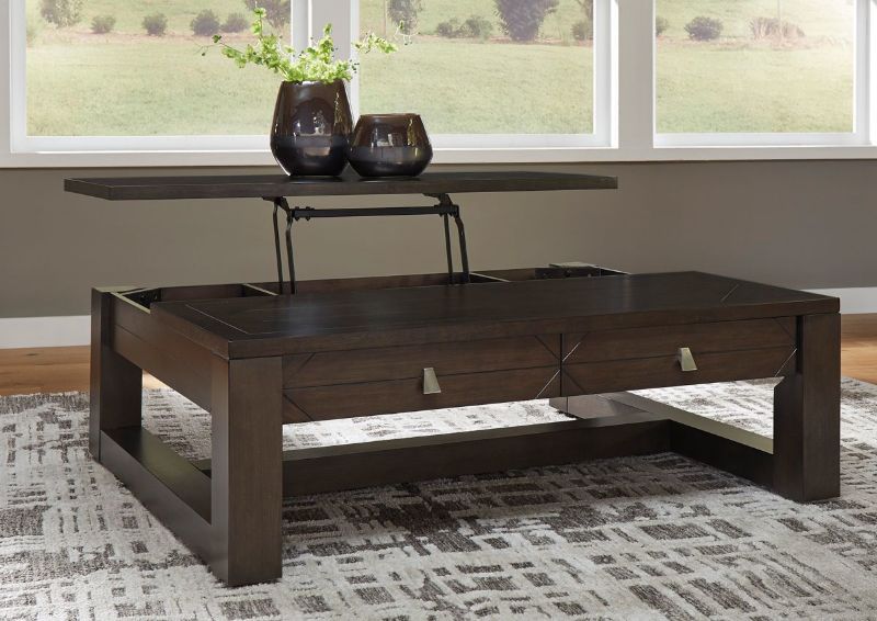 Rich Espresso Brown Tariland Lift-Top Coffee Table by Ashley Furniture Showing a Room Setting | Home Furniture Plus Bedding