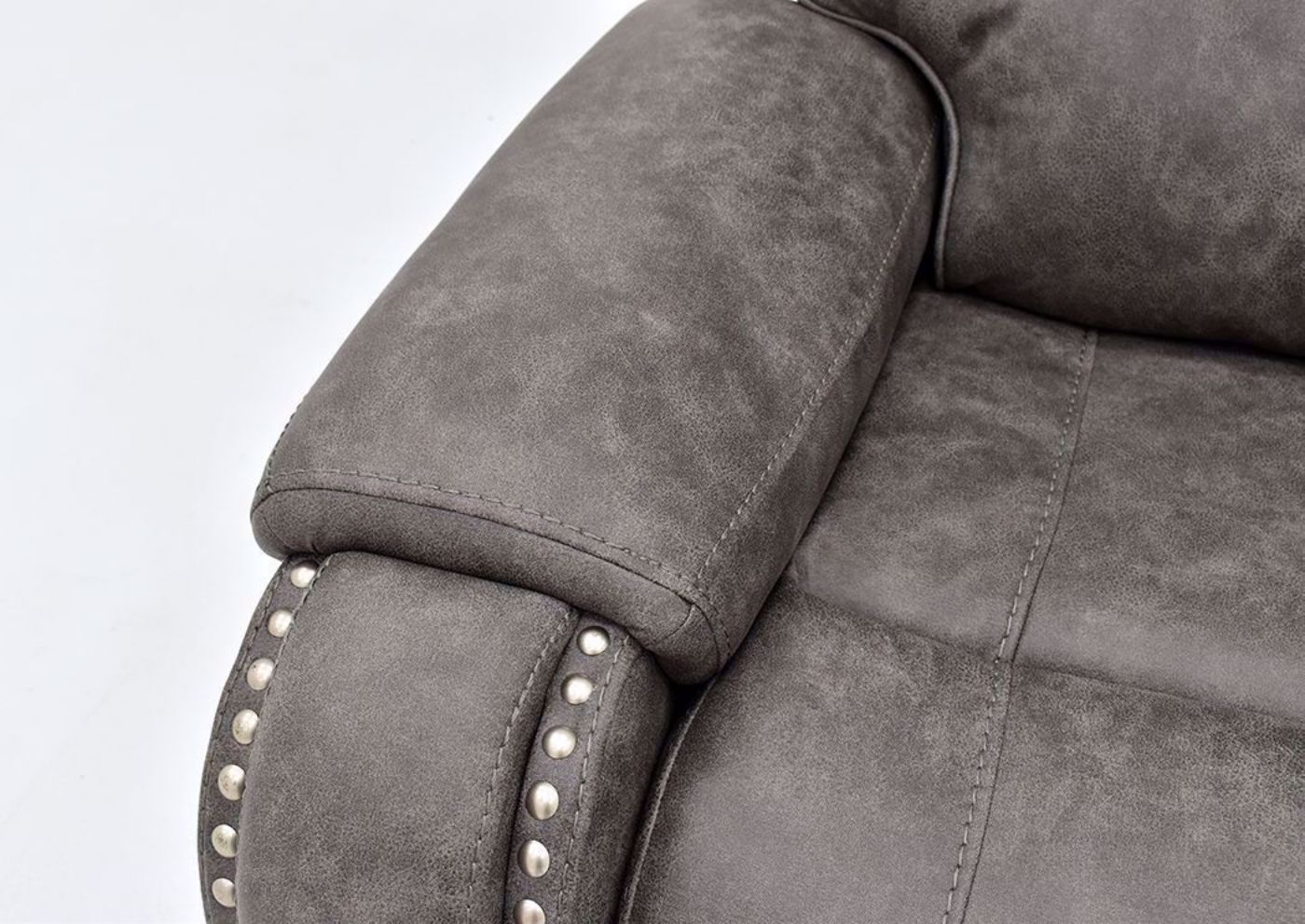 Warm Gray Clayton Reclining Sofa by Standard Showing the Arm Detail | Home Furniture Plus Mattress