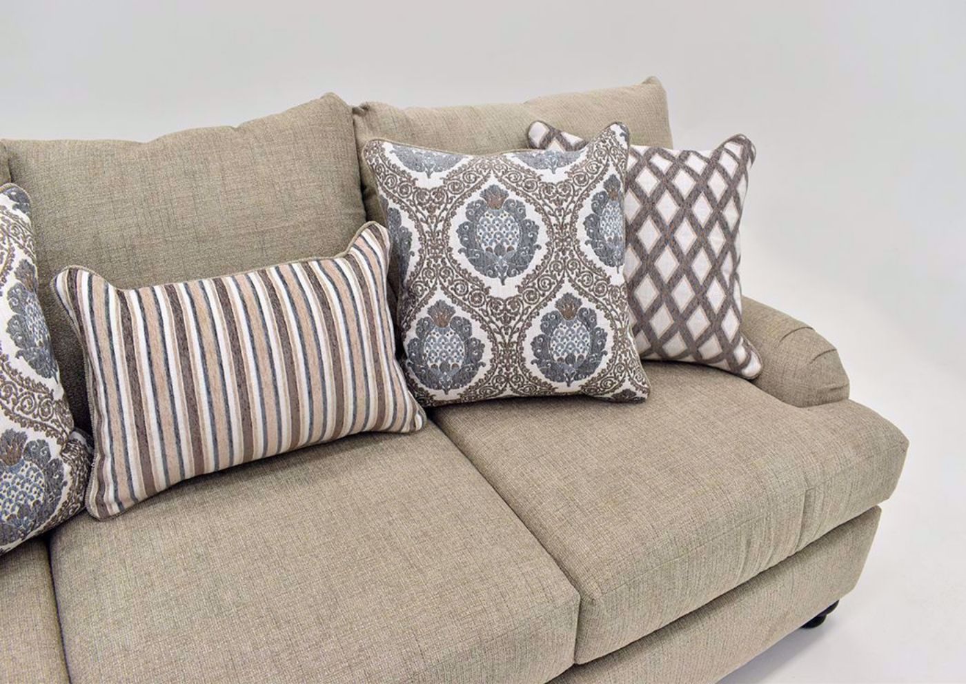 Tan Beige Archie Sofa by Albany Showing the Accent Pillows | Home Furniture Plus Mattress