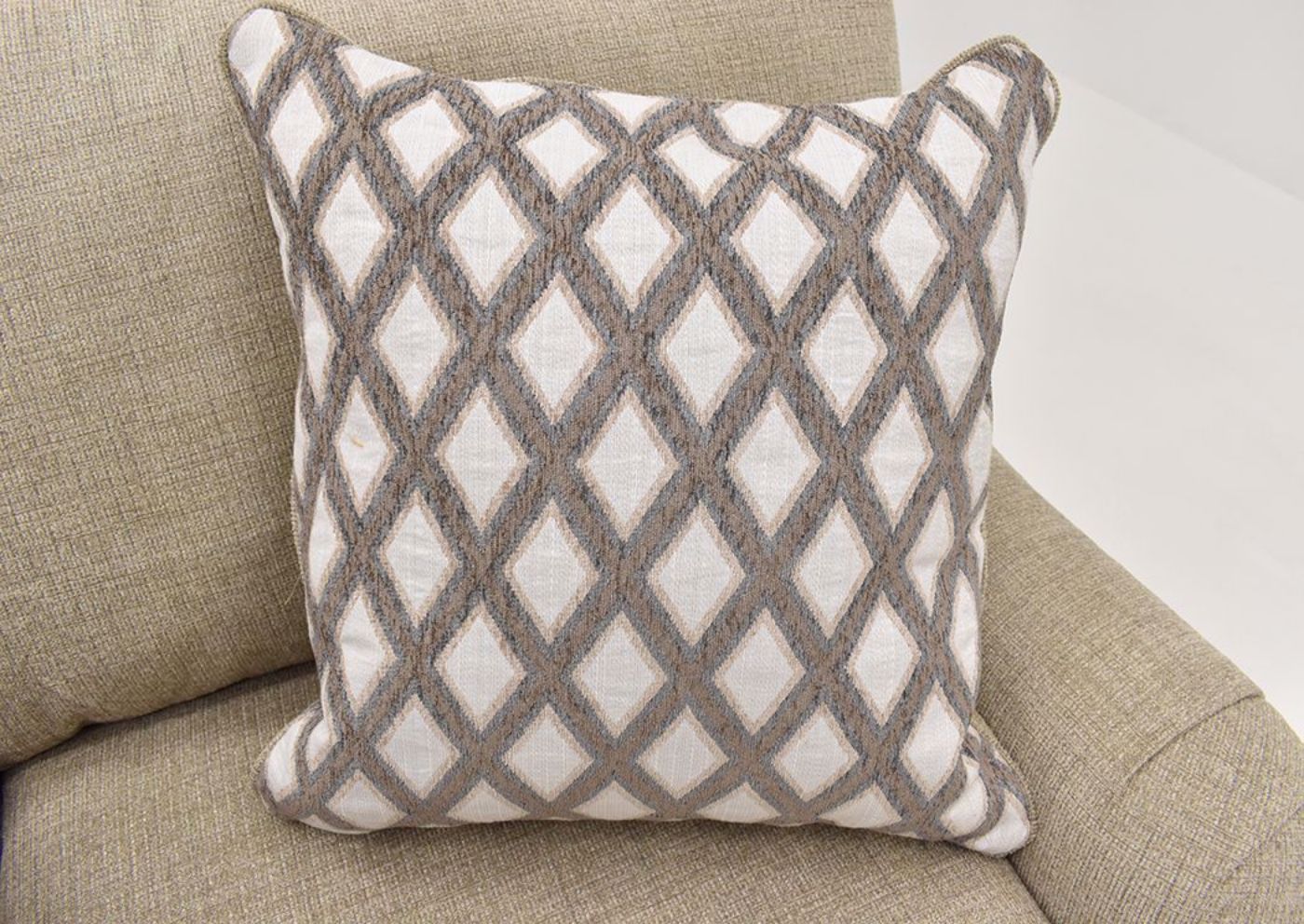 Tan Beige Archie Sofa by Albany Showing the Diamond Accent Pillow | Home Furniture Plus Mattress