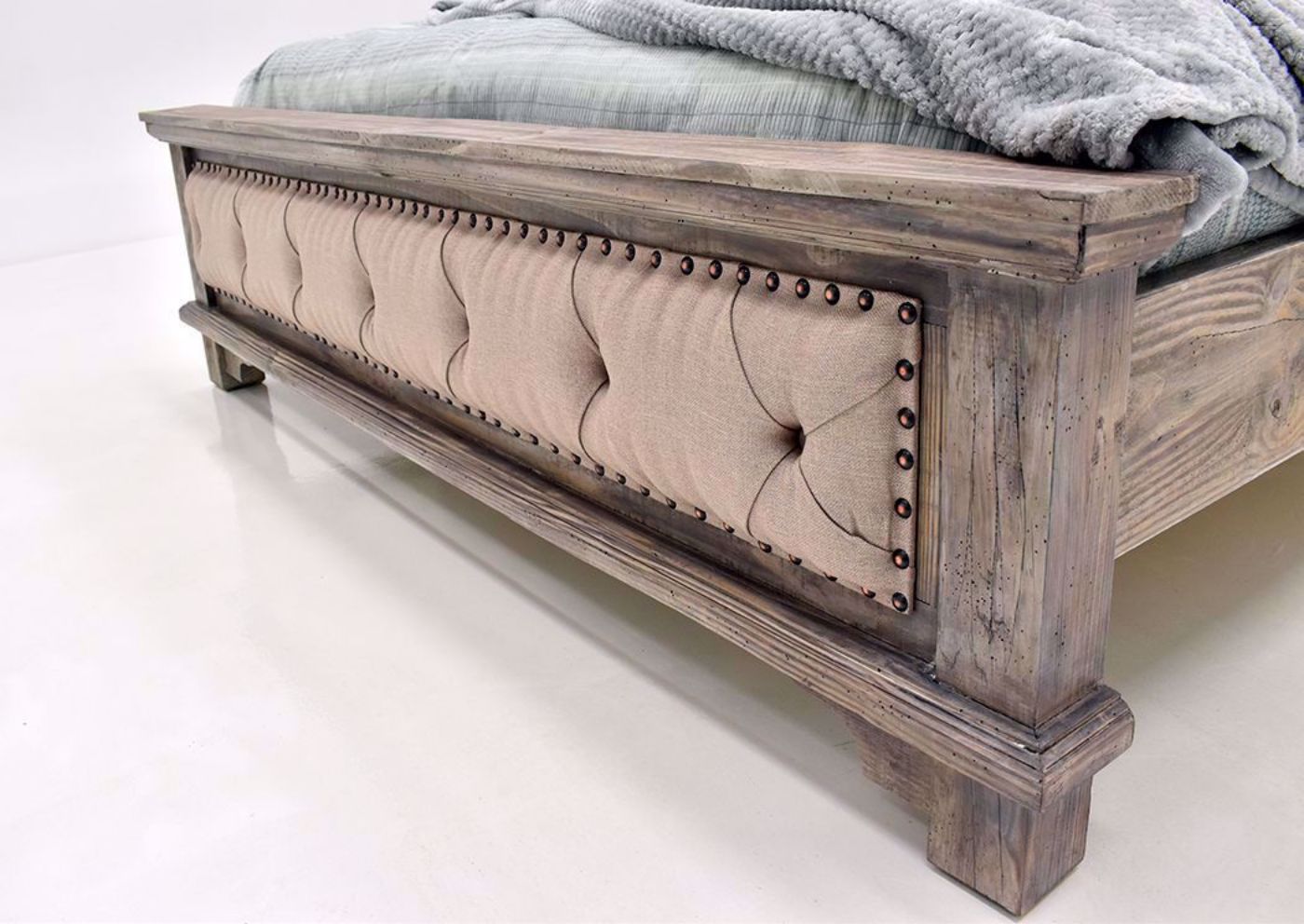Rustic Gray Charleston King Size Upholstered Bed Showing the Upholstered Footboard | Home Furniture Plus Mattress