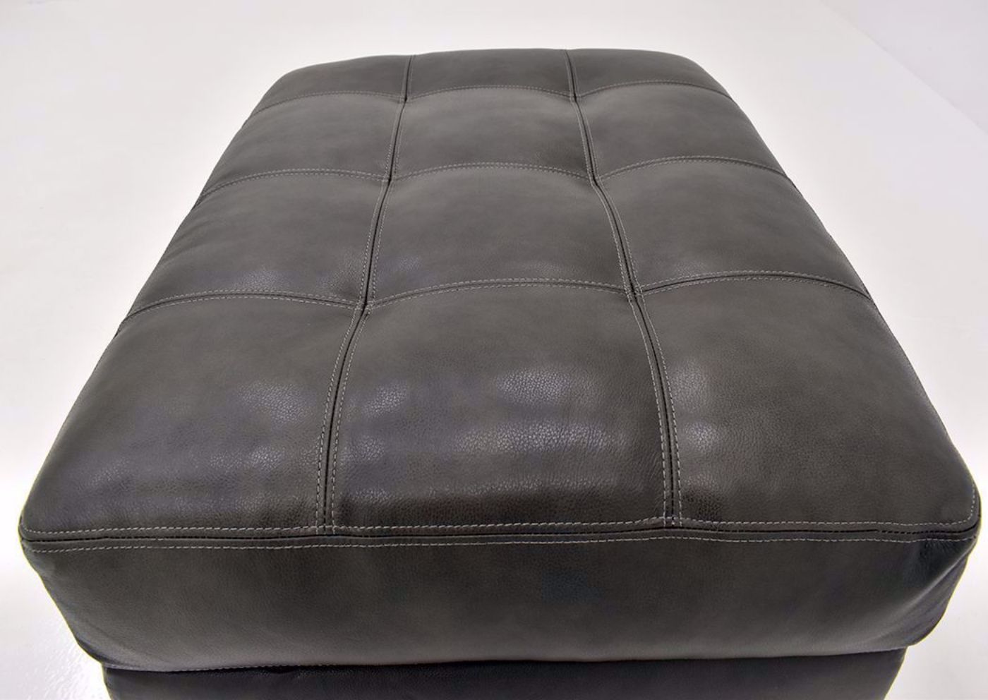 Dark Gray Leather Soft Touch Leather Ottoman by Lane Furnishings Showing the Top View | Home Furniture Plus Mattress