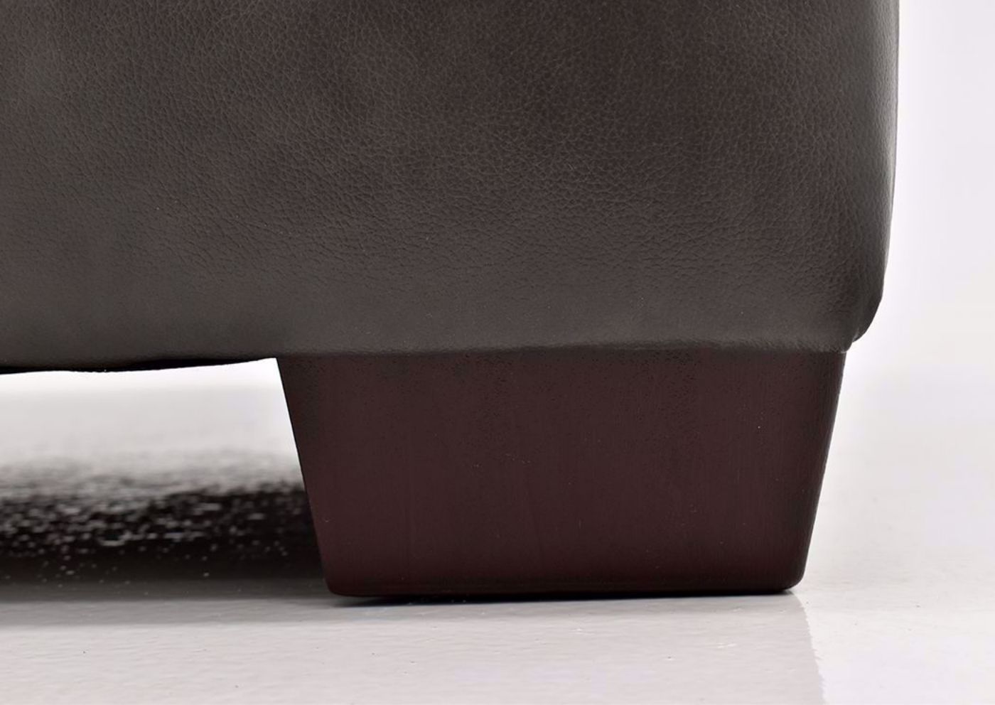 Dark Gray Leather Soft Touch Leather Ottoman by Lane Furnishings Showing the Block Foot Detail | Home Furniture Plus Mattress