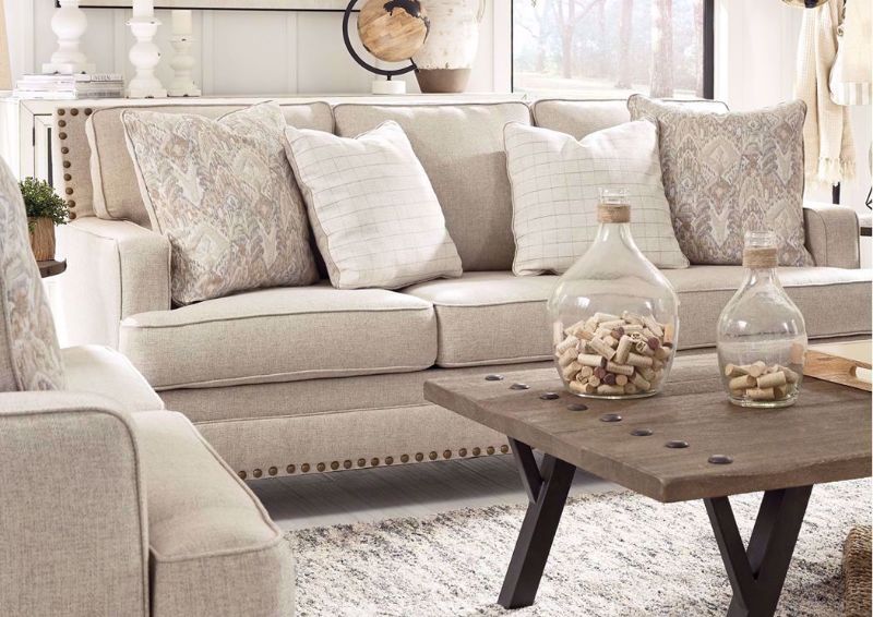 Light Beige Claredon Sofa by Ashley Furniture in a Mood Room Setting | Home Furniture Plus Mattress