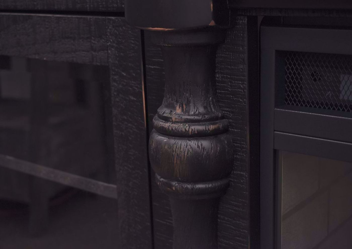 Black Mallacar TV Stand with Fireplace by Ashey Furniture Showing the Carved Details | Home Furniture Plus Mattress