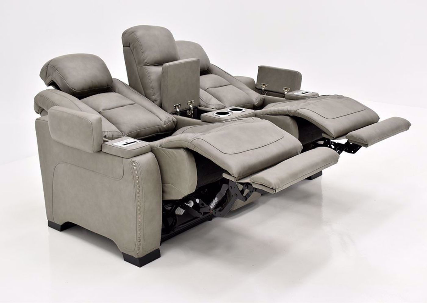 Gray Leather Man-Den Power Reclining Loveseat by Ashley Furniture at an Angle in a Fully Reclined Position | Home Furniture Plus Bedding
