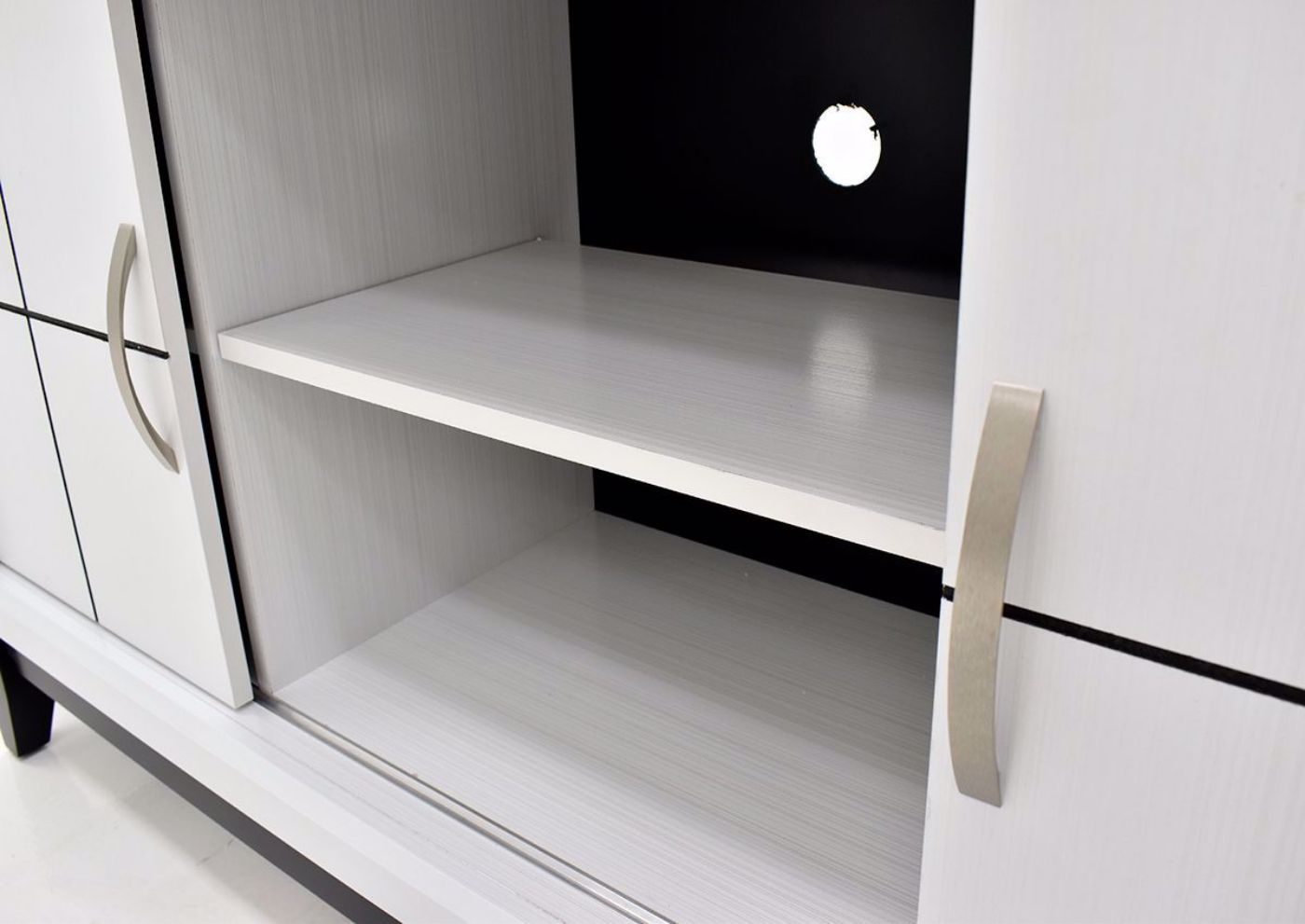 White Ackerson TV Stand by Crownmark Close Up of Middle Shelves | Home Furniture Plus Bedding