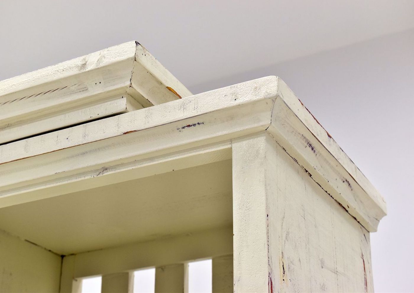 White Garrison Entertainment Center by Vintage Furniture close up top molding details | Home Furniture Plus Bedding