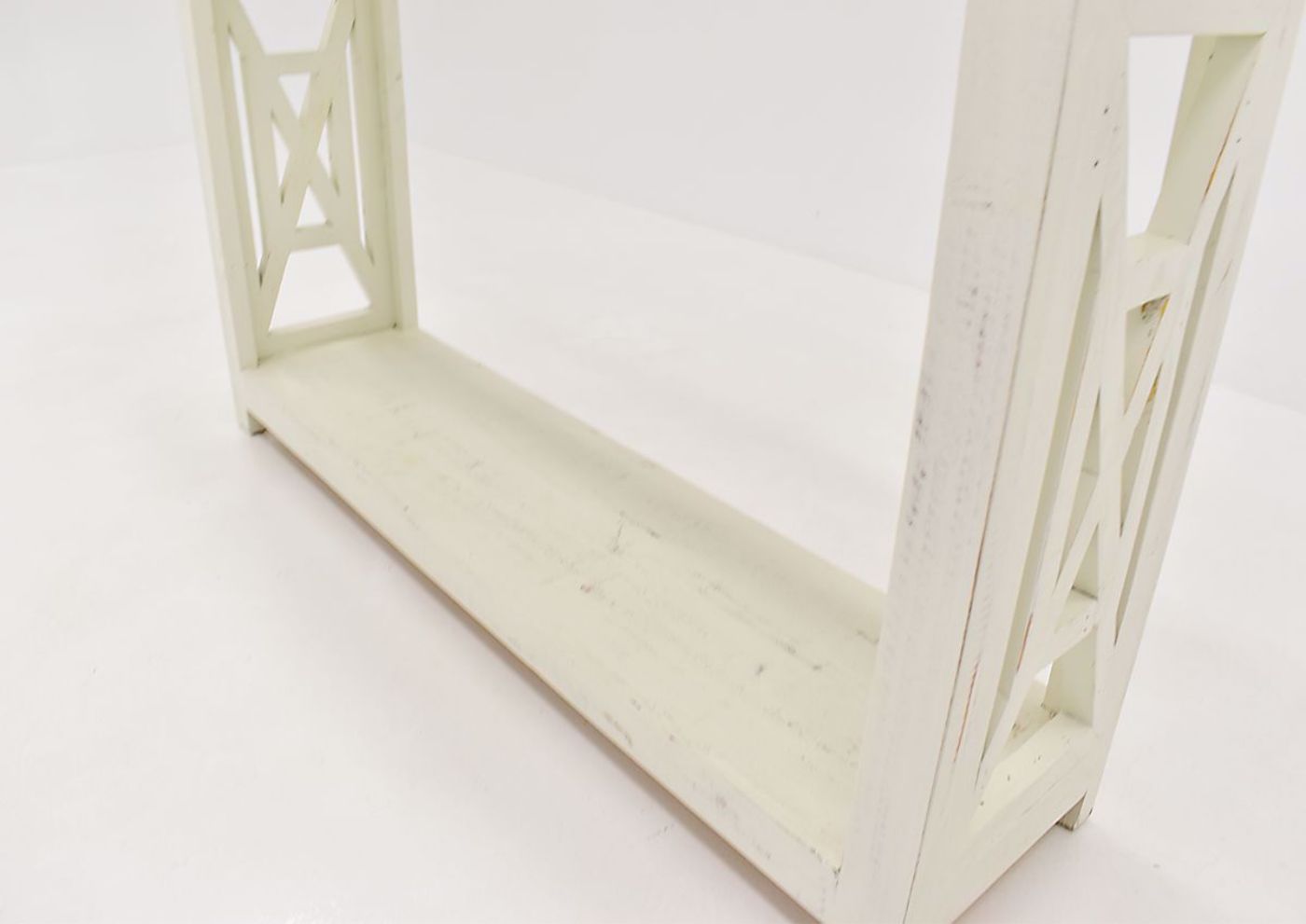 White Grande Sofa Table by Vintage Furniture close up bottom shelf | Home Furniture Plus Bedding