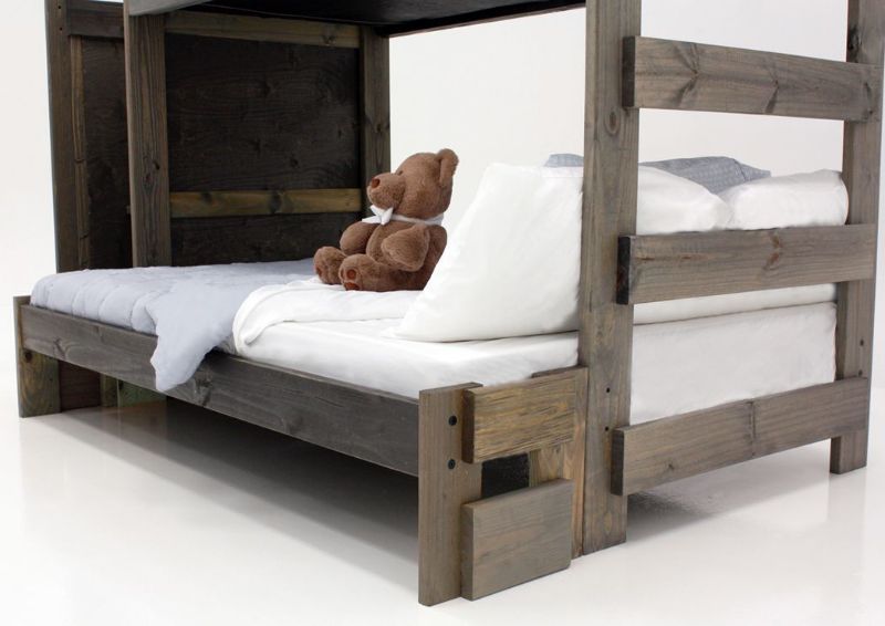 Brown Duncan Twin over Full Staircase Bunk Bed Showing the Bottom Bunk | Home Furniture Plus Mattress