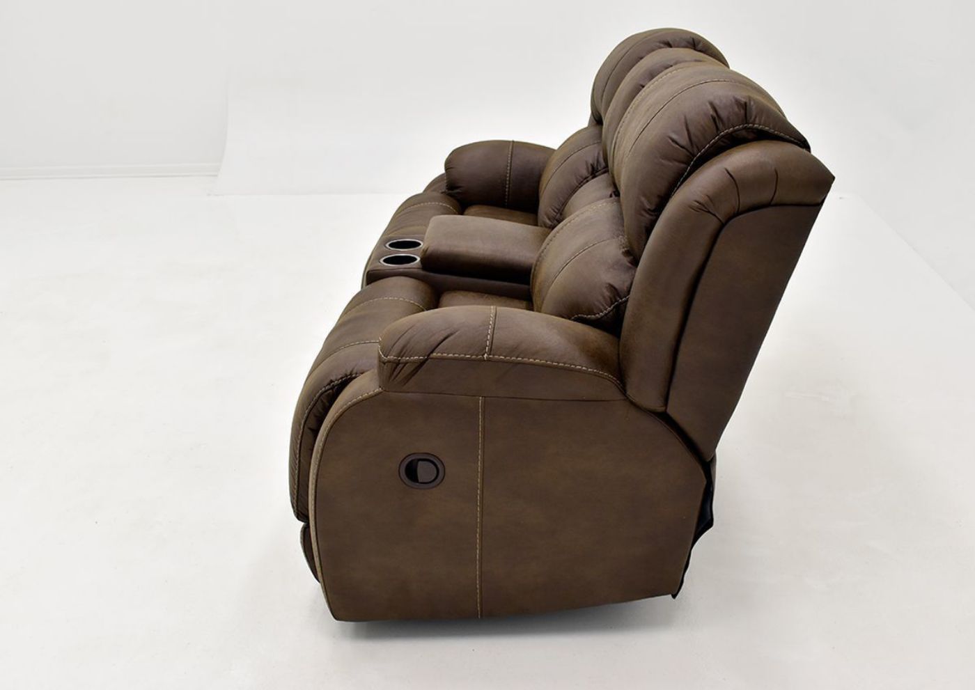 Side Facing View of the Brown Denali Reclining Loveseat by HomeStretch | Home Furniture Plus Bedding