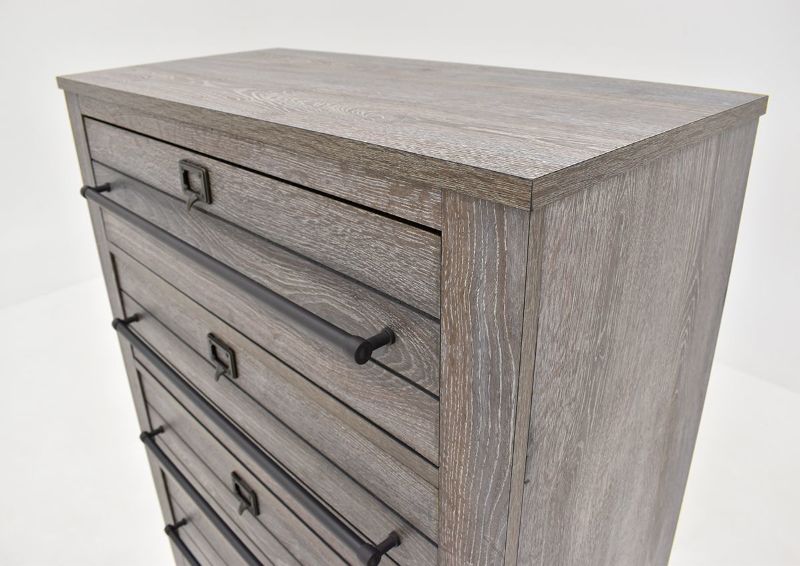 Angled View of the Top Section of the Bateson Chest of Drawers with Brown Finish and Gray Highlights  | Home Furniture Plus Bedding