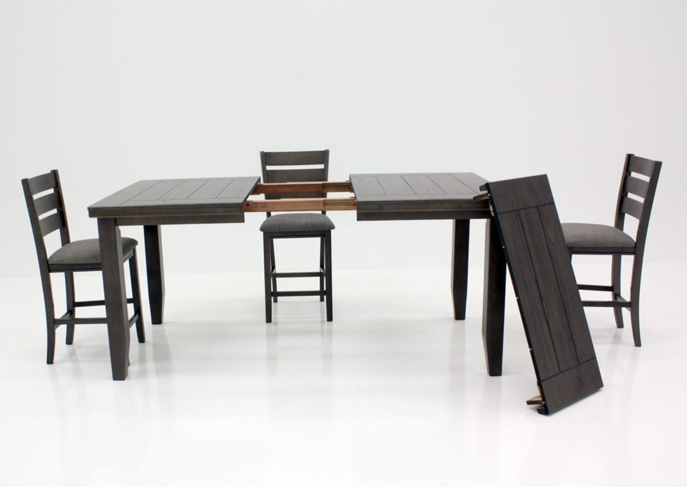 Dark Gray Bardstown Counter Height Dining Table Set Showing Open Table with Expansion Leaf Option | Home Furniture Plus Bedding