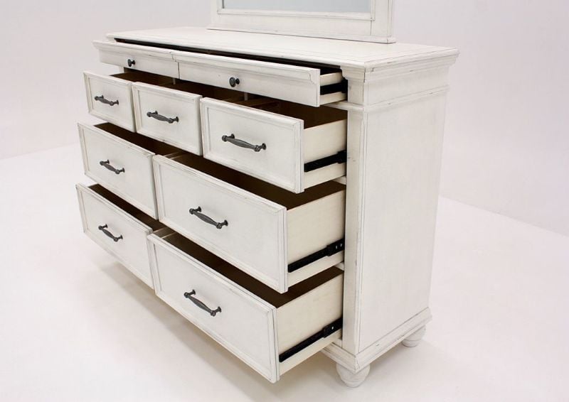 Angled View of Drawers on the White Kanwyn Dresser | Home Furniture Plus Bedding