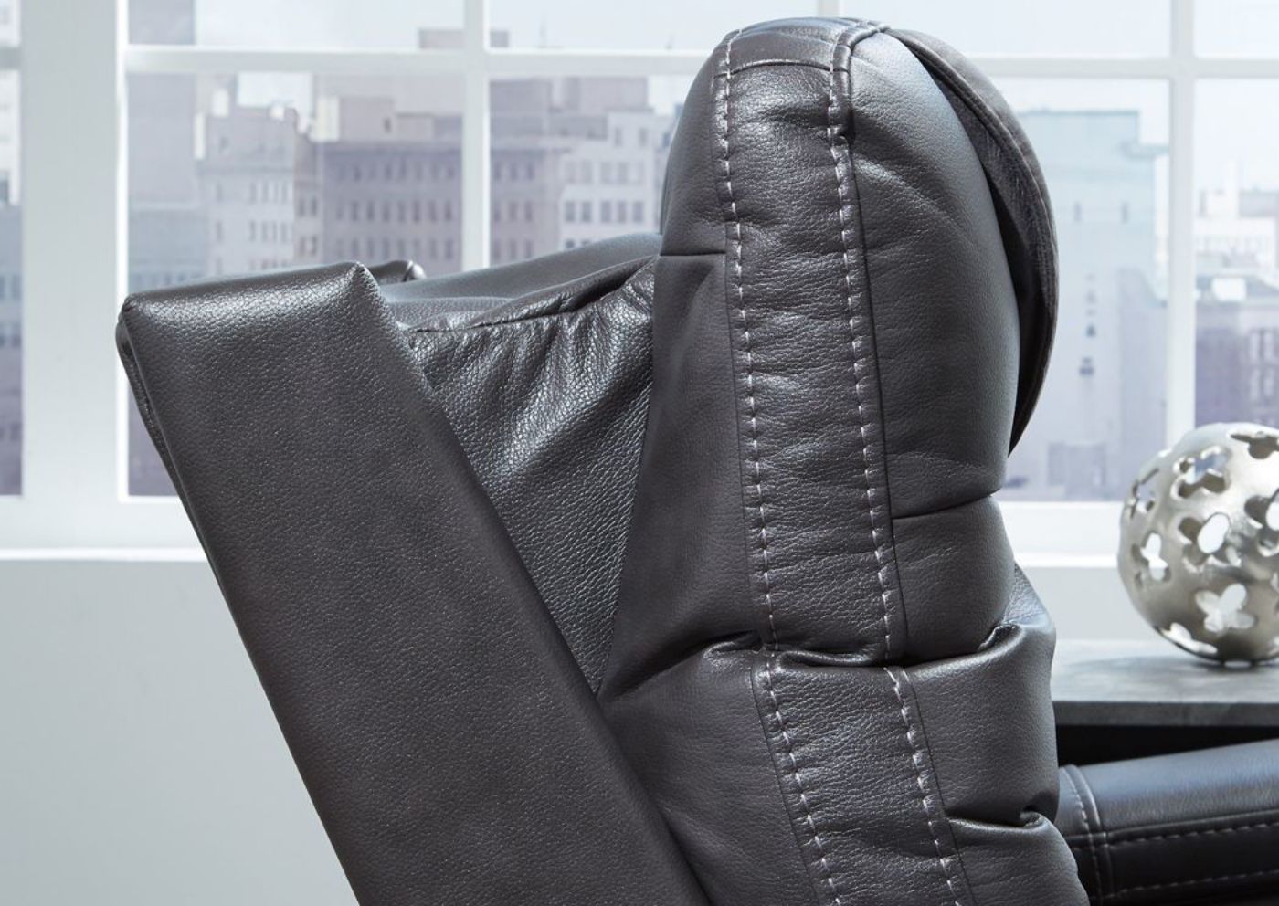 Articulating Headrest of the Composer Power Activated Recliner by Ashley Furniture Slightly Opened  | Home Furniture Plus Mattress