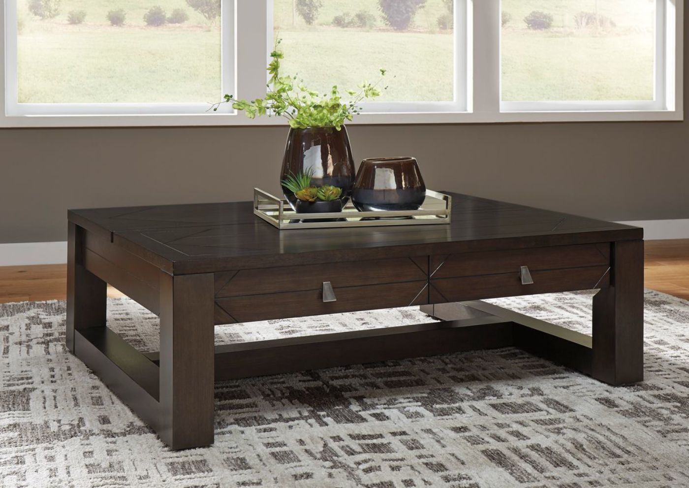 Rich Espresso Brown Tariland Lift-Top Coffee Table by Ashley Furniture Showing a Room Setting With the Table in a Closed Position | Home Furniture Plus Bedding