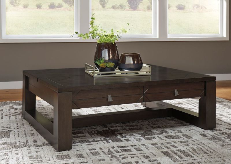Rich Espresso Brown Tariland Lift-Top Coffee Table by Ashley Furniture Showing a Room Setting With the Table in a Closed Position | Home Furniture Plus Bedding
