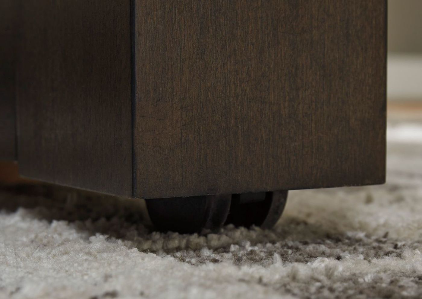 Rich Espresso Brown Tariland Lift-Top Coffee Table by Ashley Furniture Showing the Castors | Home Furniture Plus Bedding