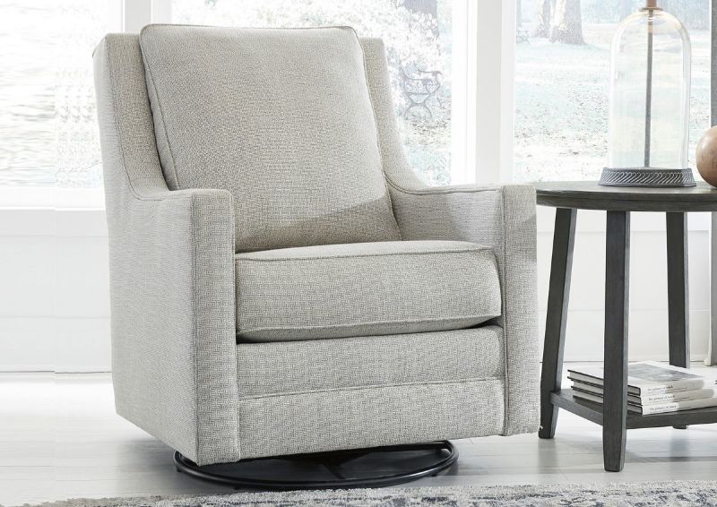 Ivory Kambria Swivel Glider Accent Chair by Ashley Furniture in a Room Setting | Home Furniture Plus Bedding
