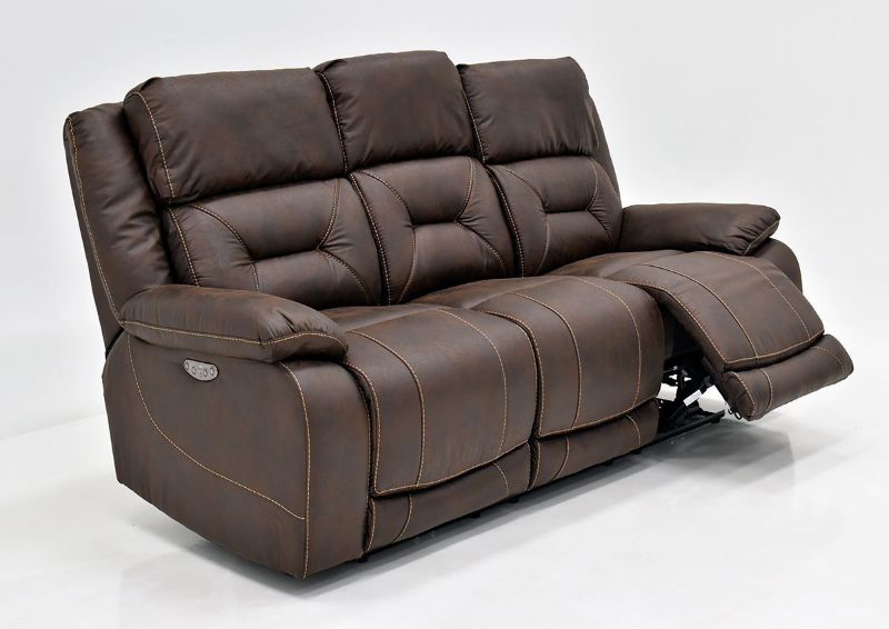 Brown Aria POWER Reclining Sofa by Steve Silver Showing the Angle View With One Recliner Open | Home Furniture Plus Bedding
