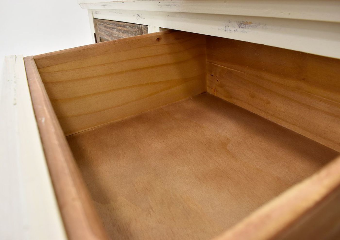 White and Brown Westgate Entertainment Center by Vintage Furniture Showing the Drawer Interior Detail | Home Furniture Plus Bedding