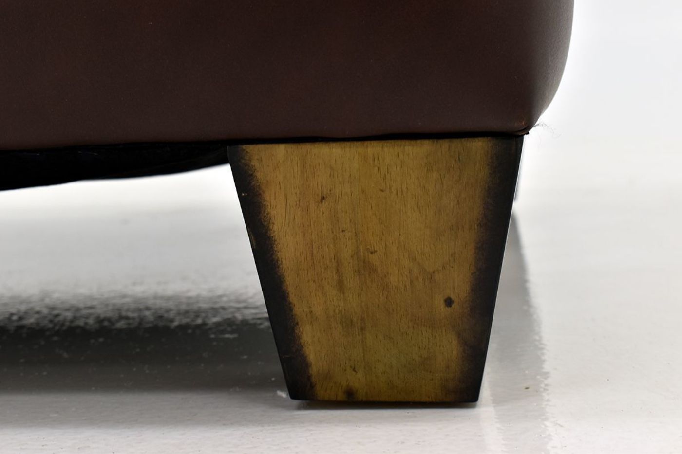 Brown Leather Monaco Loveseat by Franklin Furniture Close Up of Foot Details | Home Furniture Plus Bedding