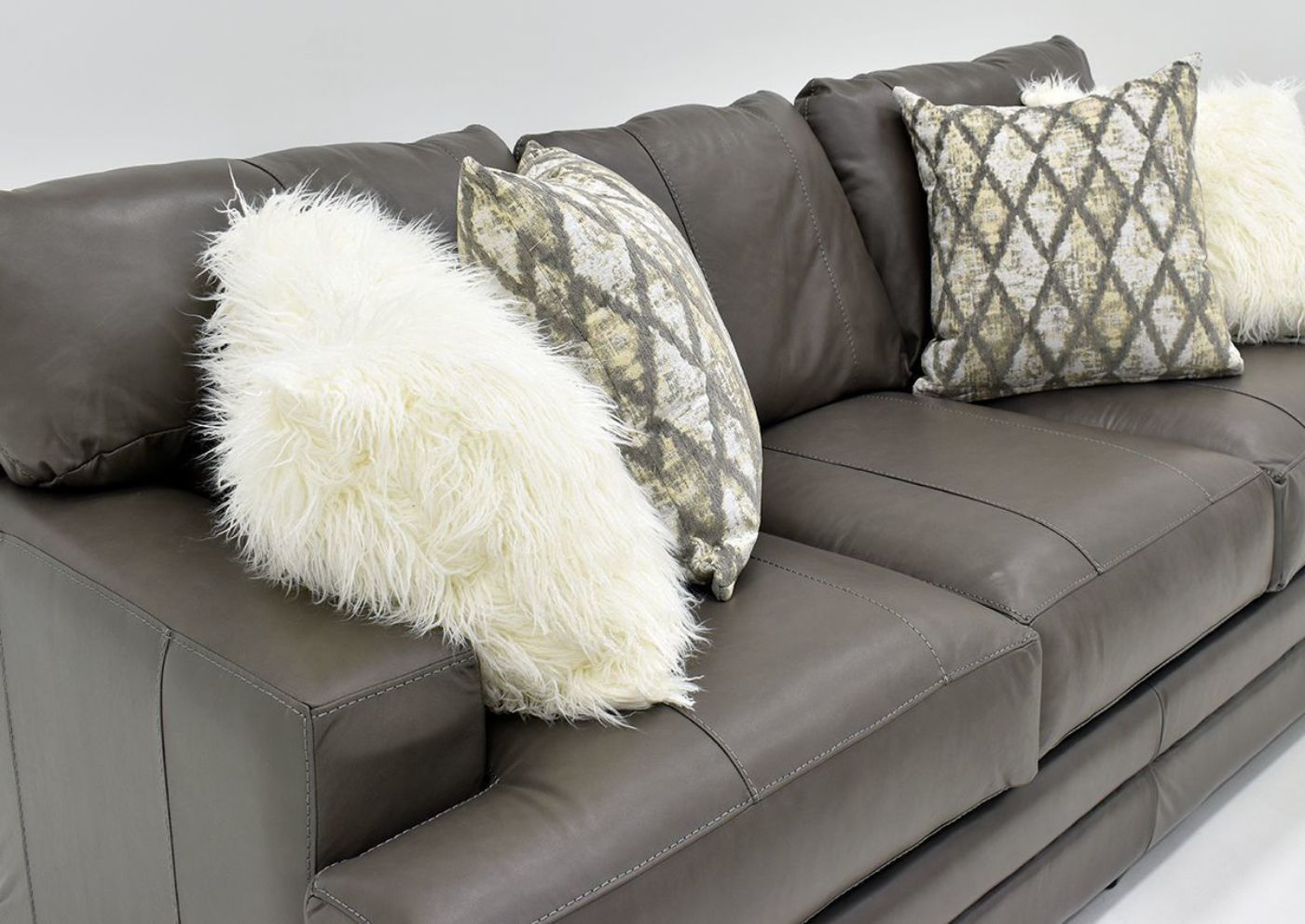 Warm Gray Lizette Leather Sofa by Franklin Furniture Showing the Angle View, Made in the USA | Home Furniture Plus Bedding