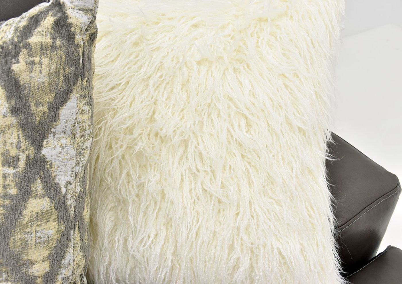Warm Gray Lizette Leather Sofa by Franklin Furniture Showing the White Fluffy Accent Pillow, Made in the USA | Home Furniture Plus Bedding