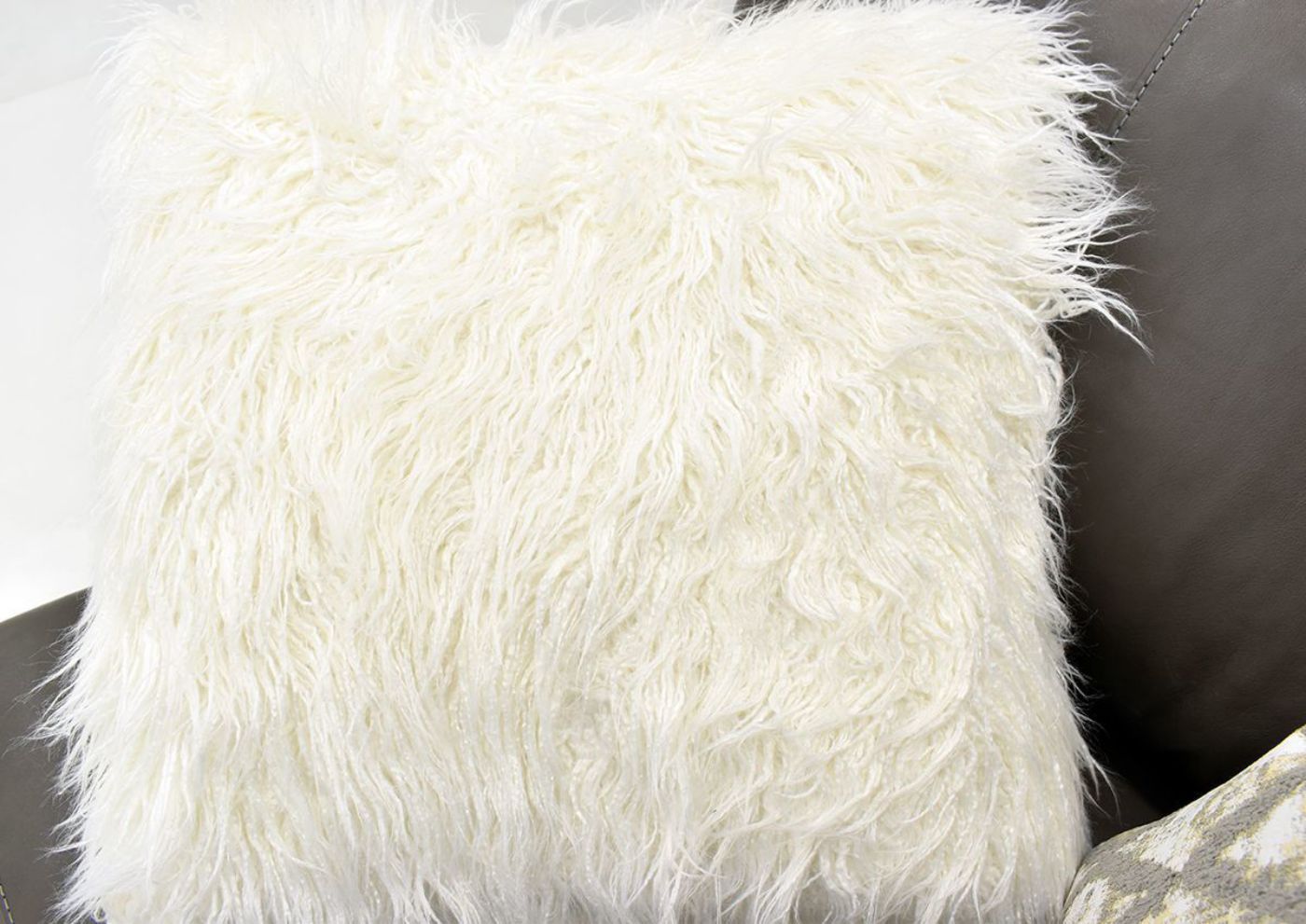 Warm Gray Lizette Leather Loveseat by Franklin Furniture Showing the Fuzzy White Accent Pillow Detail, Made in the USA | Home Furniture Plus Bedding