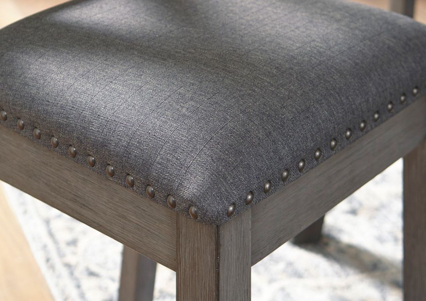 Gray Caitbrook 7 Piece Dining Set by Ashley Furniture Showing the Chair Upholstery Detail | Home Furniture Plus Bedding
