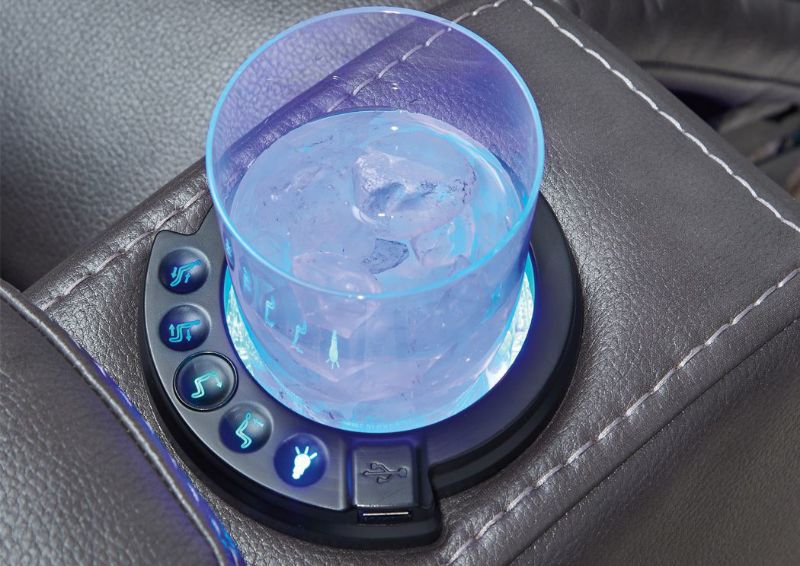 Lighted Cup Holder on the Arms on the Composer Power Activated Recliner by Ashley Furniture Slightly Opened  | Home Furniture Plus Mattress