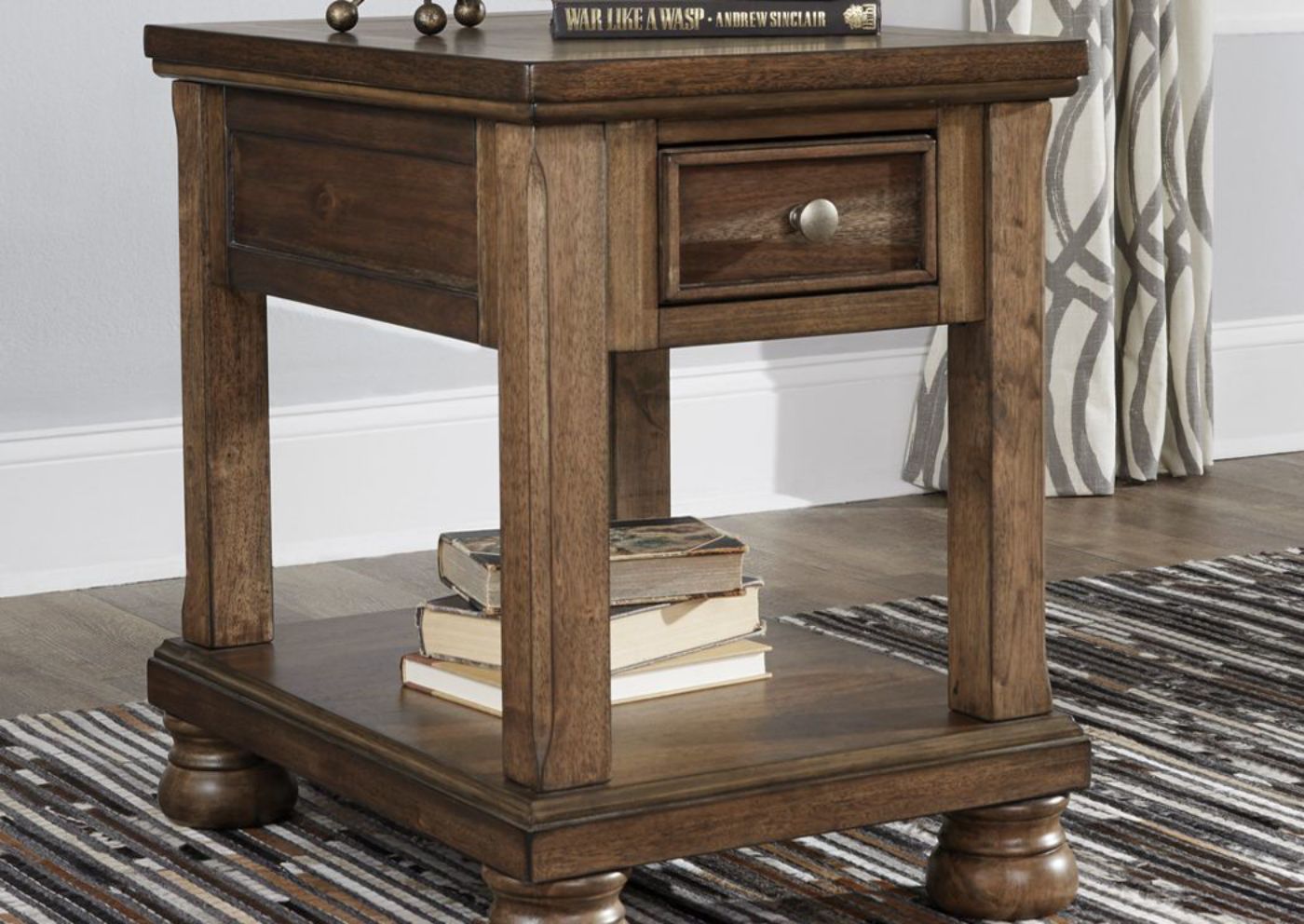 Chestnut Brown Flynnter Chairside End Table by Ashley Furniture Showing the Room Setting | Home Furniture Plus Mattress