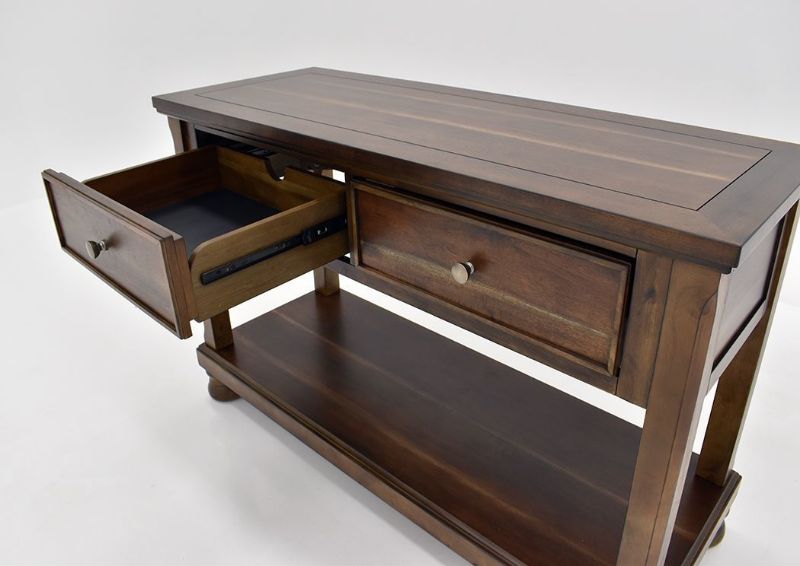 Chestnut Brown Flynnter Sofa Table by Ashley Furniture Showing a Drawer Open | Home Furniture Plus Mattress