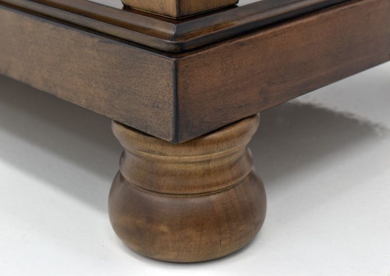 Chestnut Brown Flynnter Chairside End Table by Ashley Furniture Showing the Bun Style Foot Detail | Home Furniture Plus Mattress