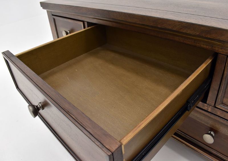 Chestnut Brown Flynnter Coffee Table by Ashley Furniture Showing the Drawer Interior Detail | Home Furniture Plus Mattress