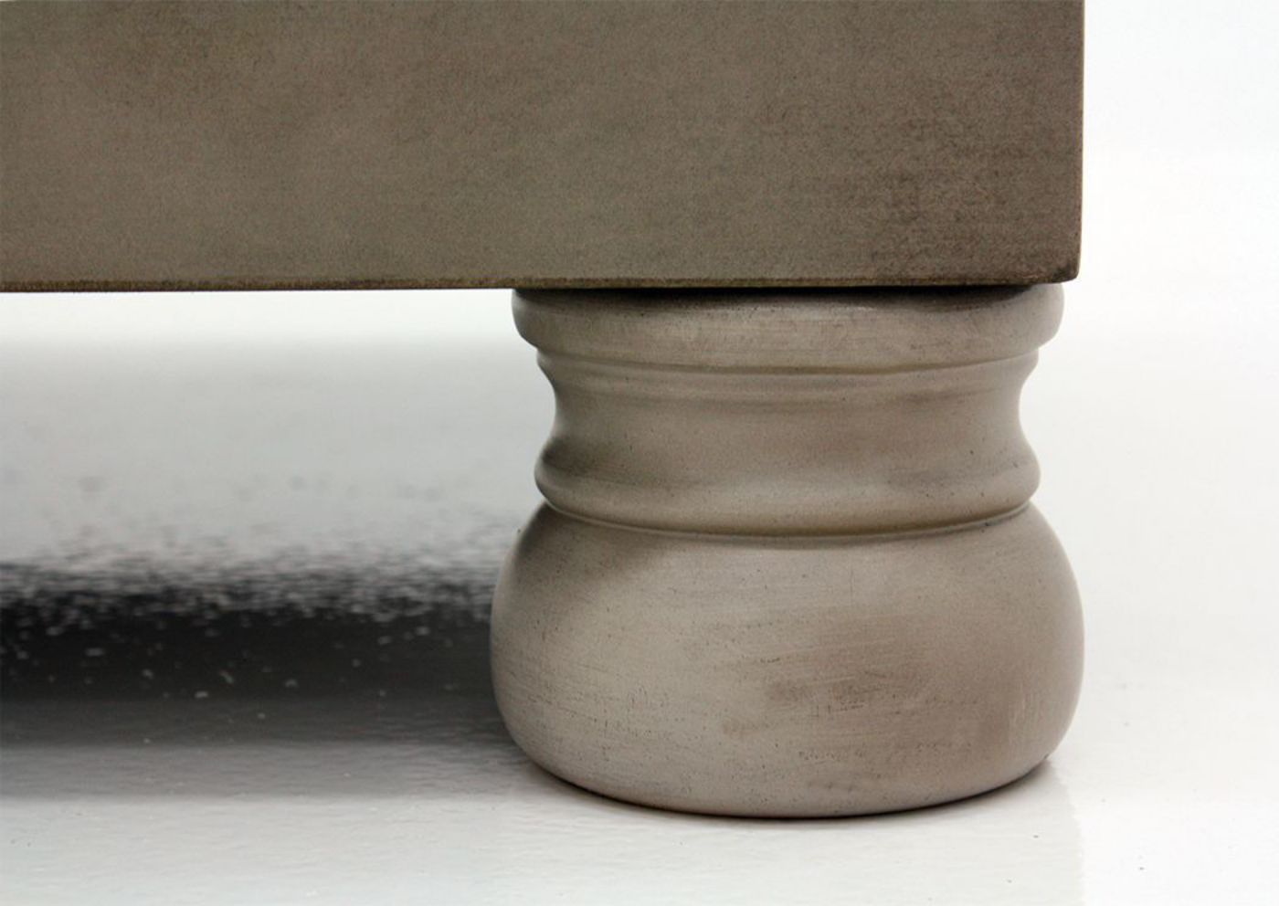 Burnished Gray Lettner Lift-Top Coffee Table by Ashley Furniture Showing the Turned Bun Style Foot | Home Furniture Plus Mattress