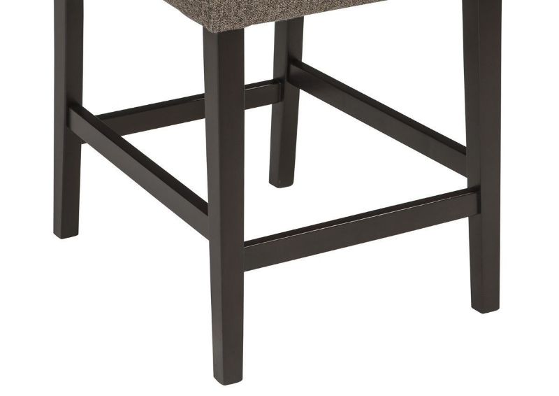 Tripton 24 Inch Warm Gray Upholstered Bar Stool by Ashley Showing the Leg Detail | Home Furniture Plus Bedding