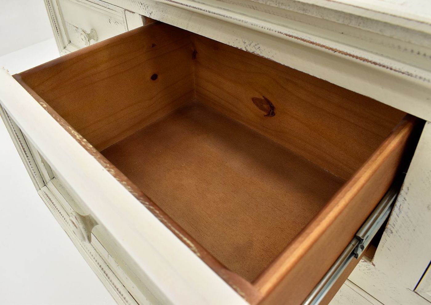White Westgate Dresser with Mirror by Vintage Furniture Showing the Drawer Interior | Home Furniture Plus Bedding