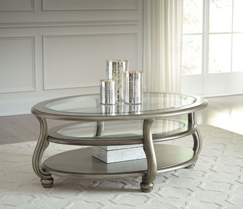 Metallic Silver Coralayne Coffee Table by Ashley Furniture Showing the Room View | Home Furniture Plus Bedding