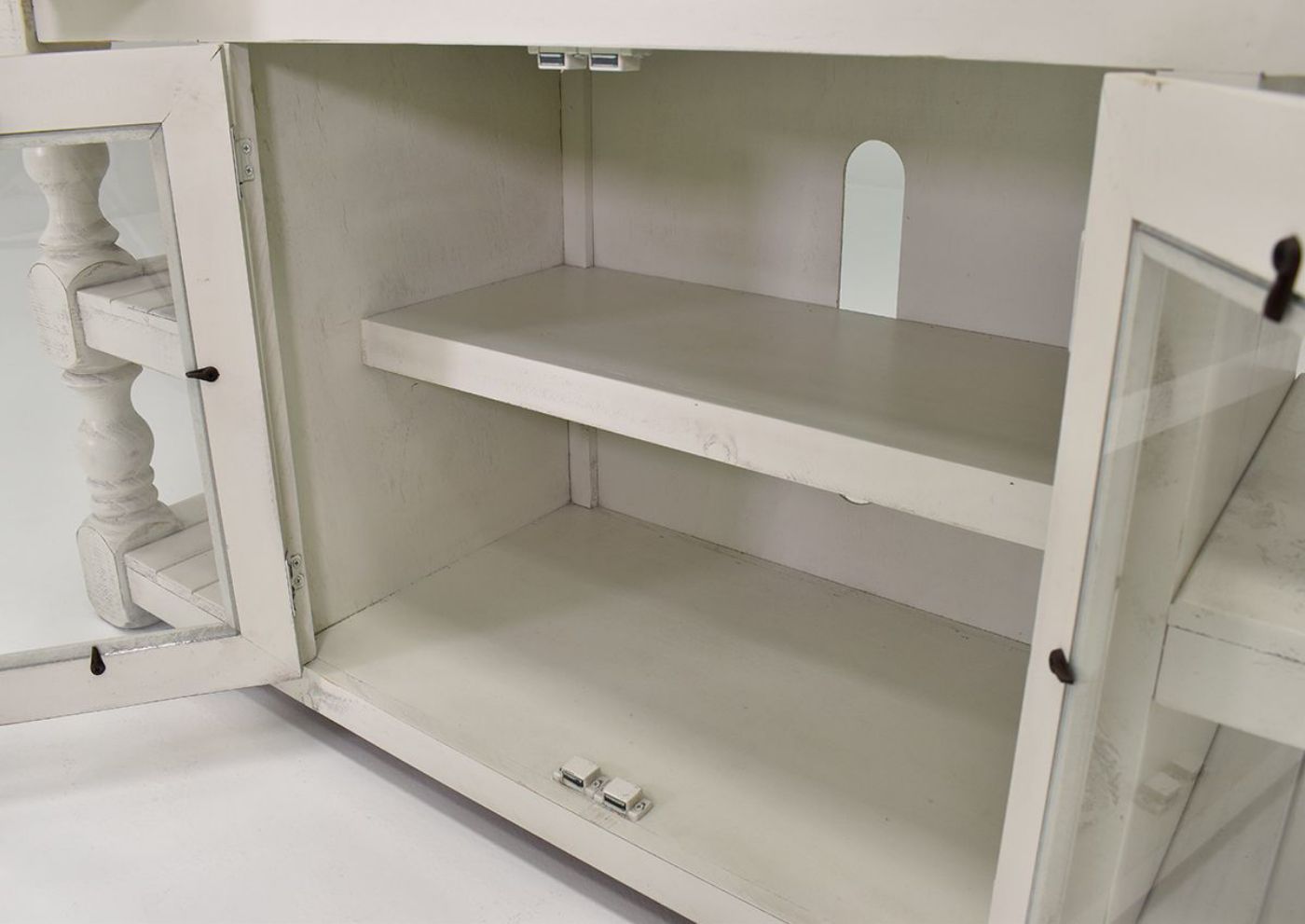 Off White Stone 60 Inch TV Stand by International Furniture Showing the Interior Shelving of the Cabinet | Home Furniture Plus Bedding